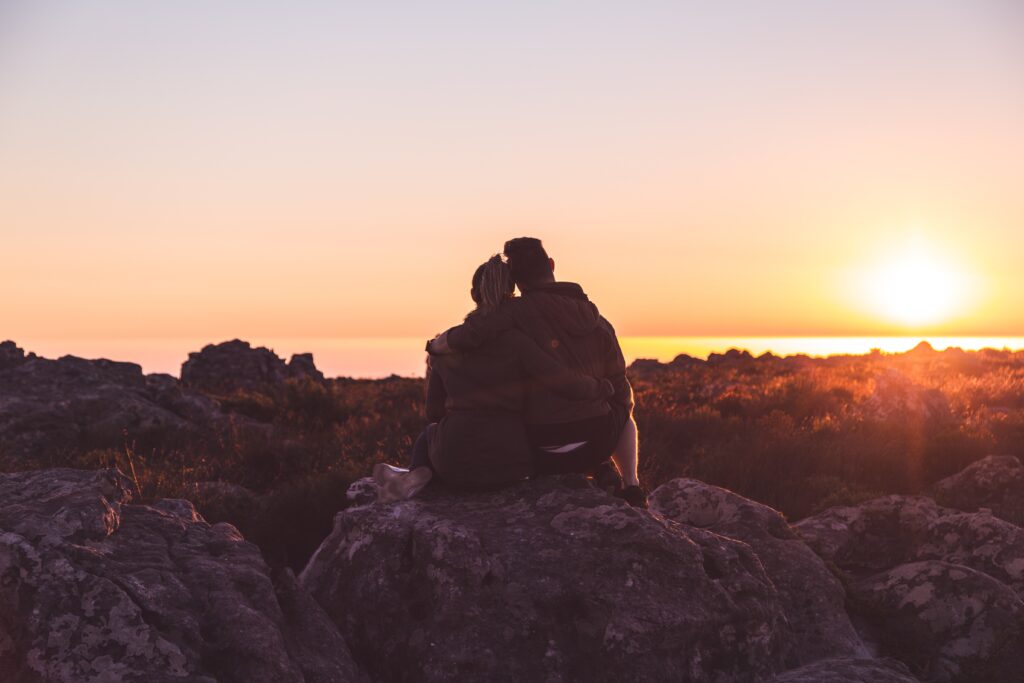 hiking date -together watching a sunset